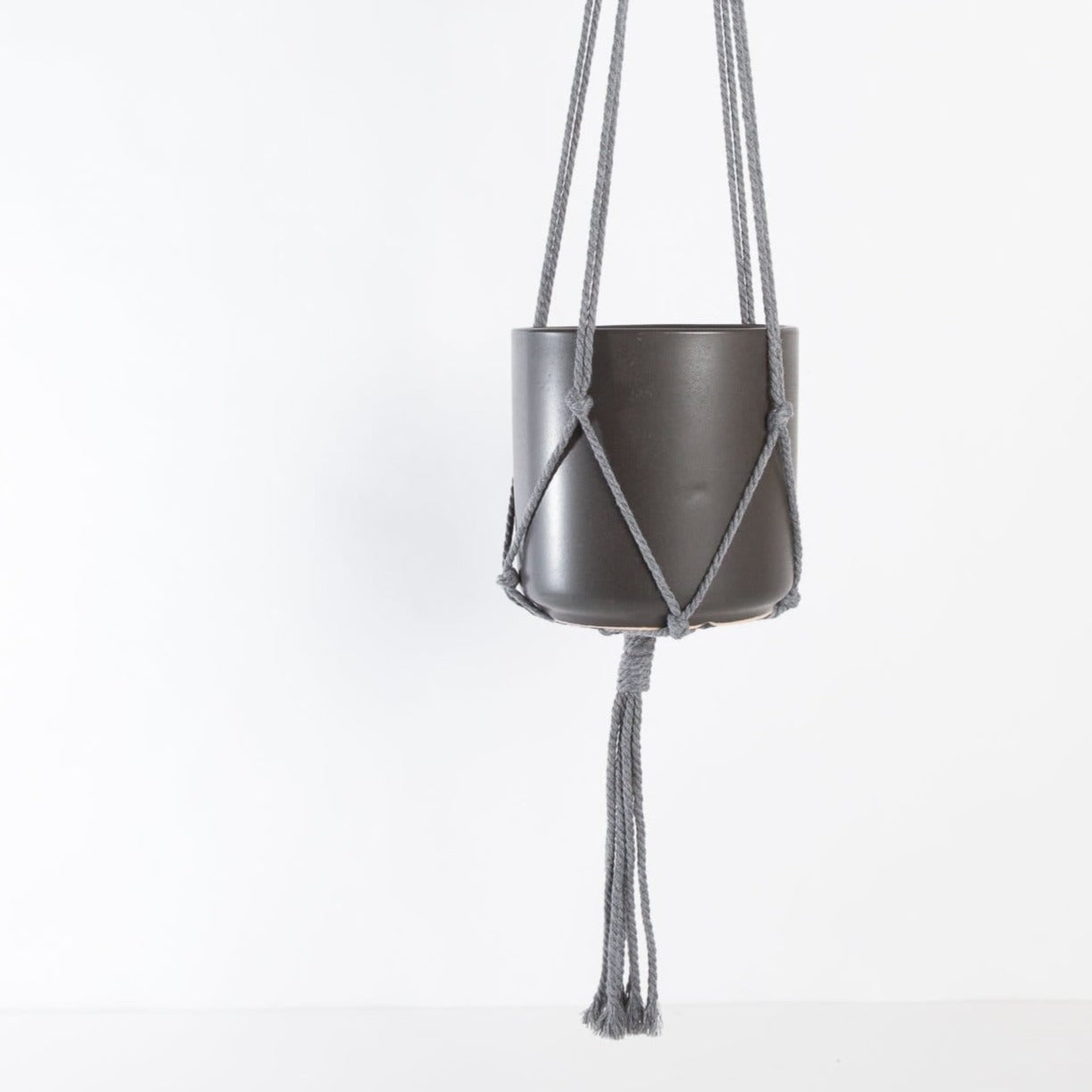 black and white macrame plant hanger Macrame Plant Hanger - Grey